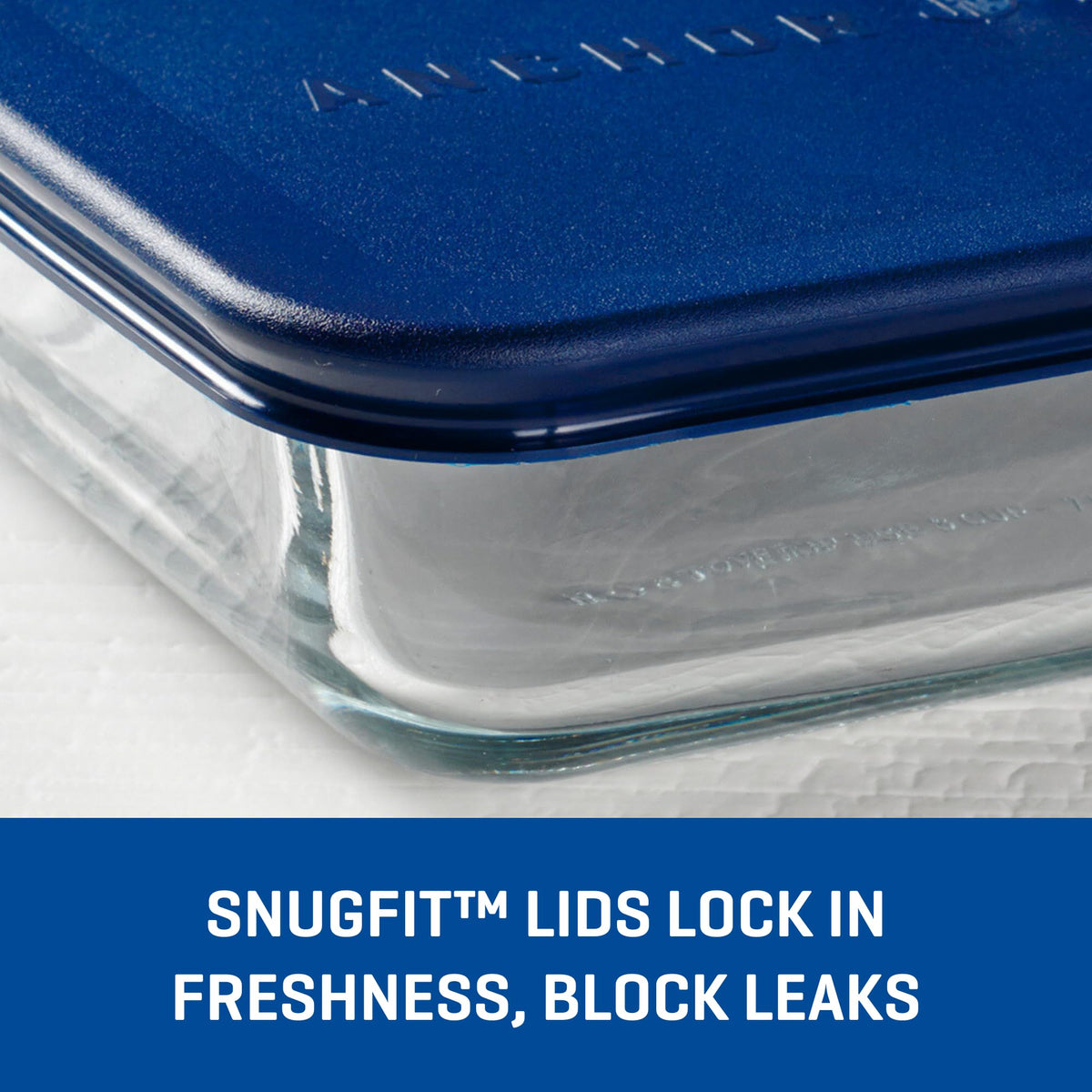 Anchor Hocking SnugFit rectangular glass container with lid on, showing secure seal for leftovers