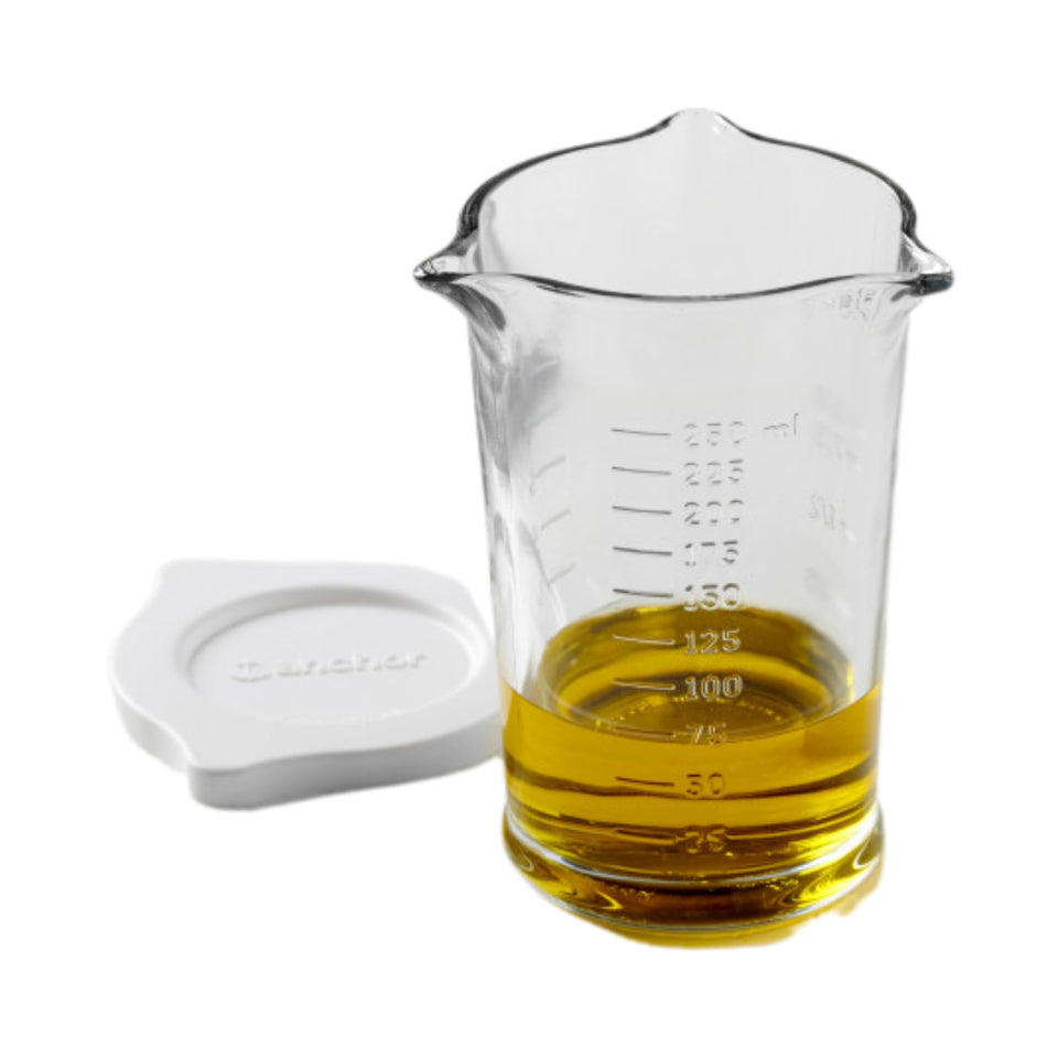 Anchor Hocking triple pour measuring cup with three spouts for controlled pouring and reduced spills.