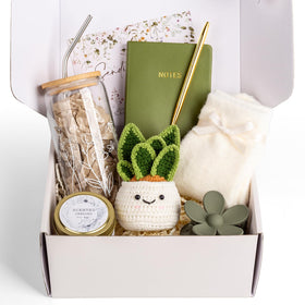Anforsun lavender candle within the care package provides calming aroma for relaxation.