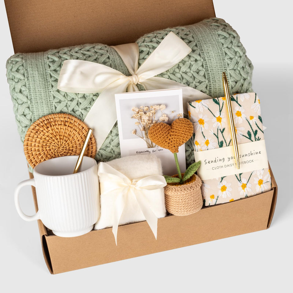 Anforsun self-care gift basket featuring a tassel blanket for cozy warmth.