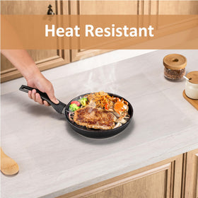 Angadona mat being cleaned; dishwasher-safe and easy to wipe down.