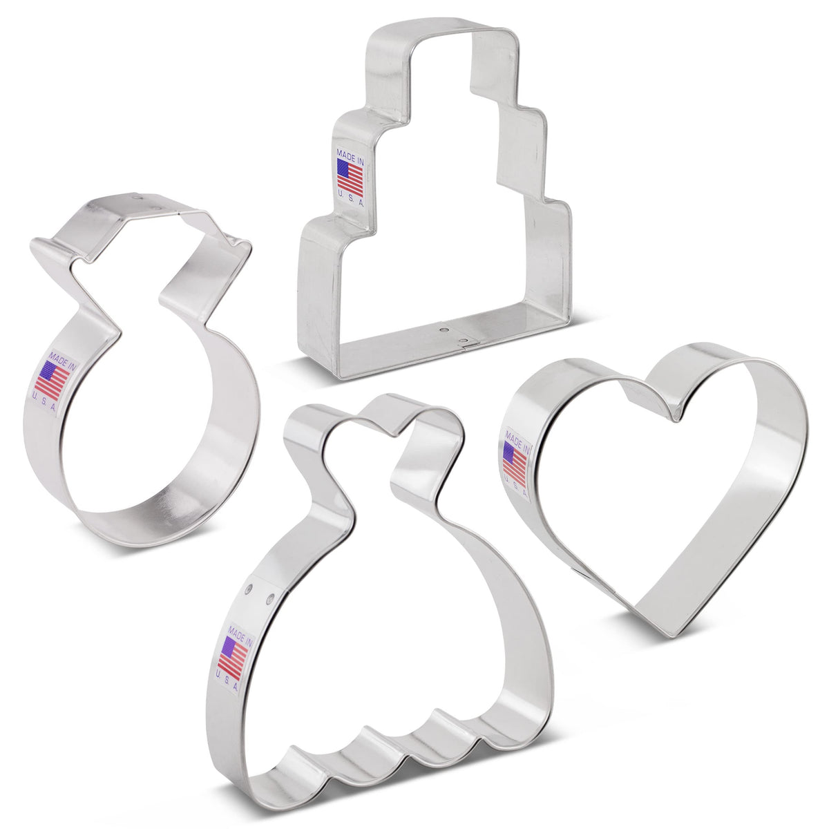 Ann Clark Cookie cutters in action cutting dough into wedding shapes.