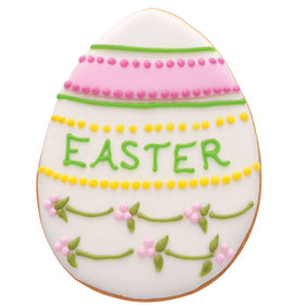Ann Clark Easter decorating setup with icing and sprinkles for vibrant cookies.