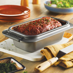 Close-up of Anolon loaf pan's nonstick coating for clean release.