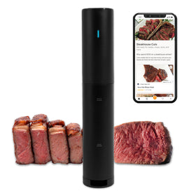 Anova Culinary Sous Vide Mini on the counter for precise steak doneness at home.
