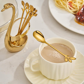 AnSaw gold kitchen counter organization with a sleek spoon set