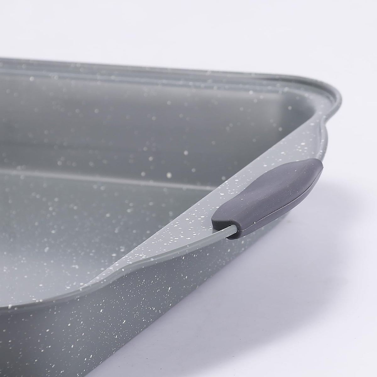 Anveena red silicone handles provide a comfortable grip while transferring hot pans.