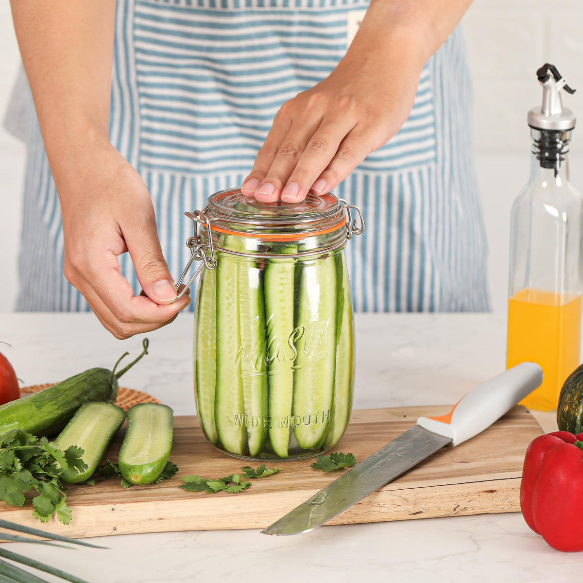 Anwoi 32oz jars with hinged lids store spices, jams, or snacks neatly.