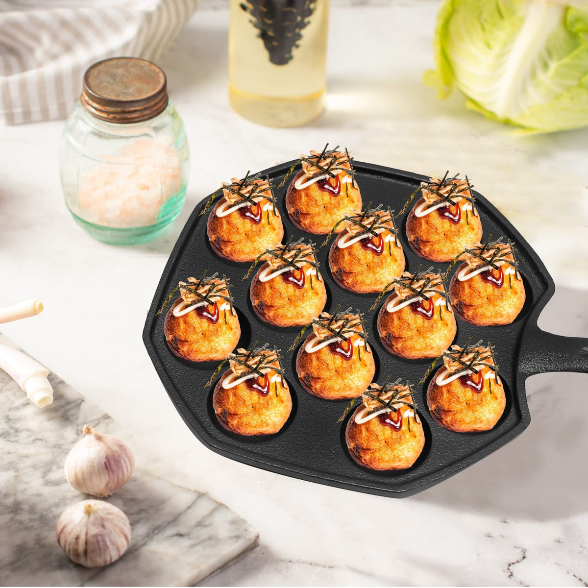 Anxingo Takoyaki pan with insulated gloves for safe handling.