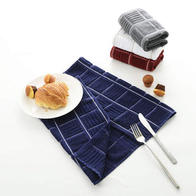 Anyi glassware drying with absorbent towels – protects delicate cups and plates.