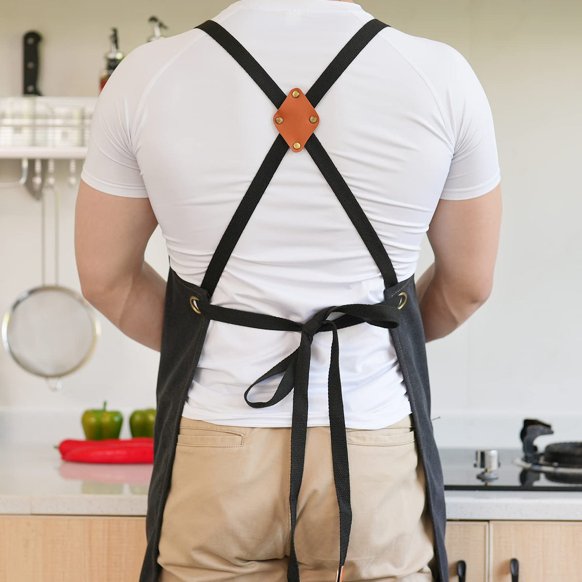 Aoomzoon full-coverage apron protects clothing during cooking and grilling.