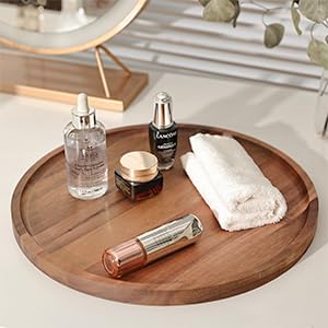 Aoravvik acacia wood grain on a round tray adds rustic charm.