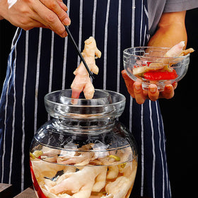 Aosnttol sauerkraut jar keeps vegetables submerged and microbes contained.