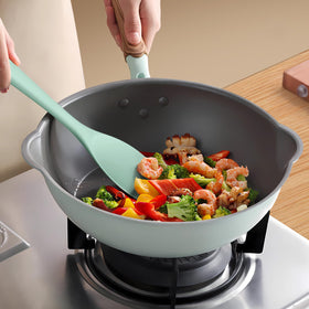 AOTHOD silicone egg whisk beats eggs smoothly with no metal mess.