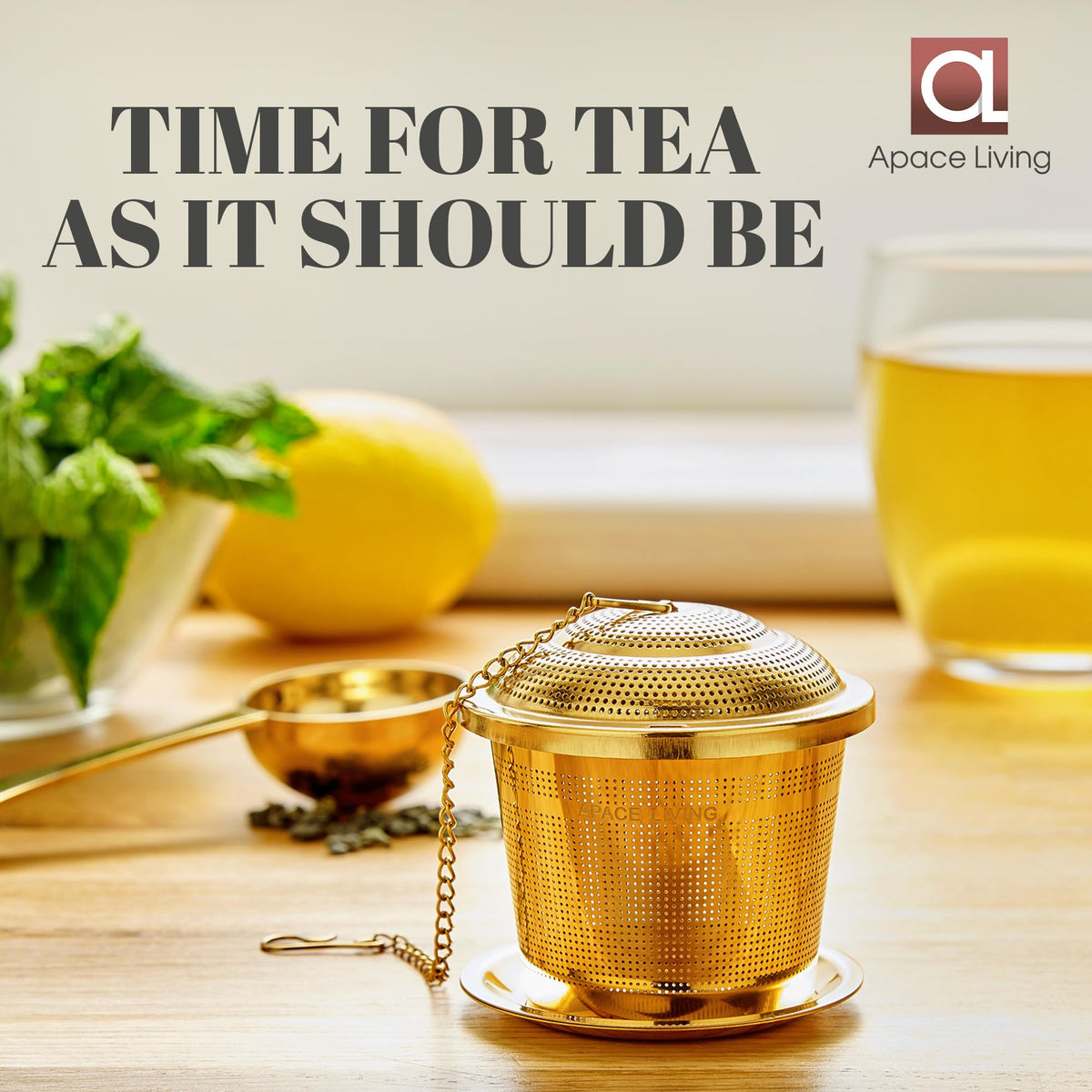 Apace Living tea scoop placed beside the infuser for measurement.