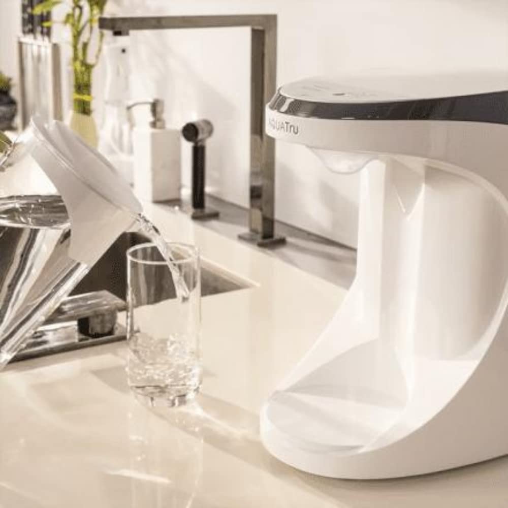 AquaTru AT100 carafe in fridge keeps cold purified water ready