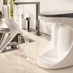 AquaTru AT100 carafe in fridge keeps cold purified water ready