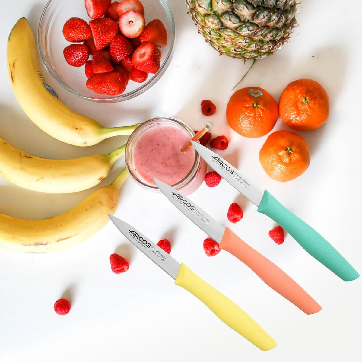 Arcos Nova paring knife with dishwasher-safe orange handle for easy cleanup.