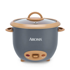 AROMA 6-Cup rice cooker with caramel panel enables effortless one-touch meals.