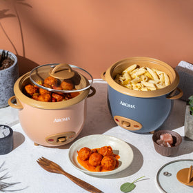 Versatile Aroma cooker handling rice, grains, soups, and dips with ease.