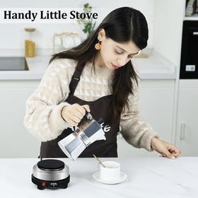 Artilife compact stove in cabinets demonstrates space-saving design.