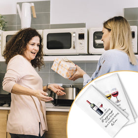 ArtisaEura eco-friendly gift towels beside wine glasses for entertaining