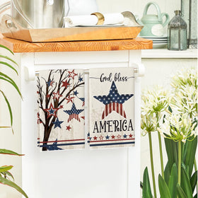 Artoid Mode America Stars Tree towel absorbing spills while brightening counters.