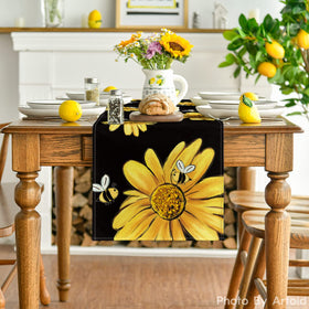 Artoid Mode bee-sunflower pattern on black fabric adds lively color to meals