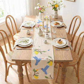 Artoid Mode beige embroidery detail on table runner for refined tables