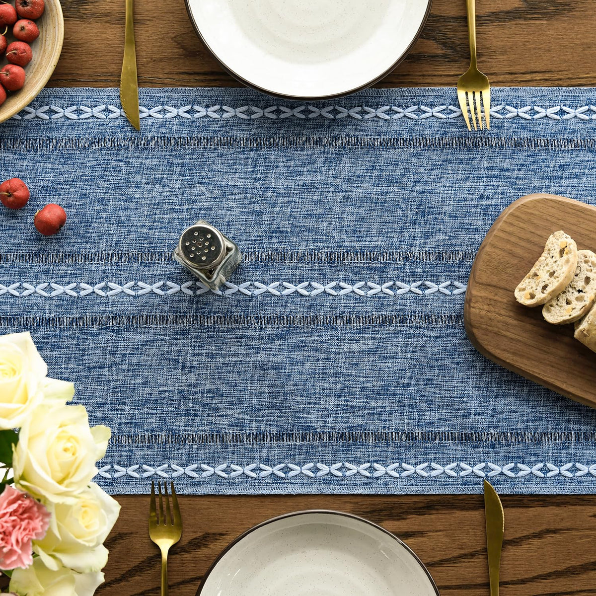 Artoid Mode blue rustic table runner on dining table enhances everyday meals with color.