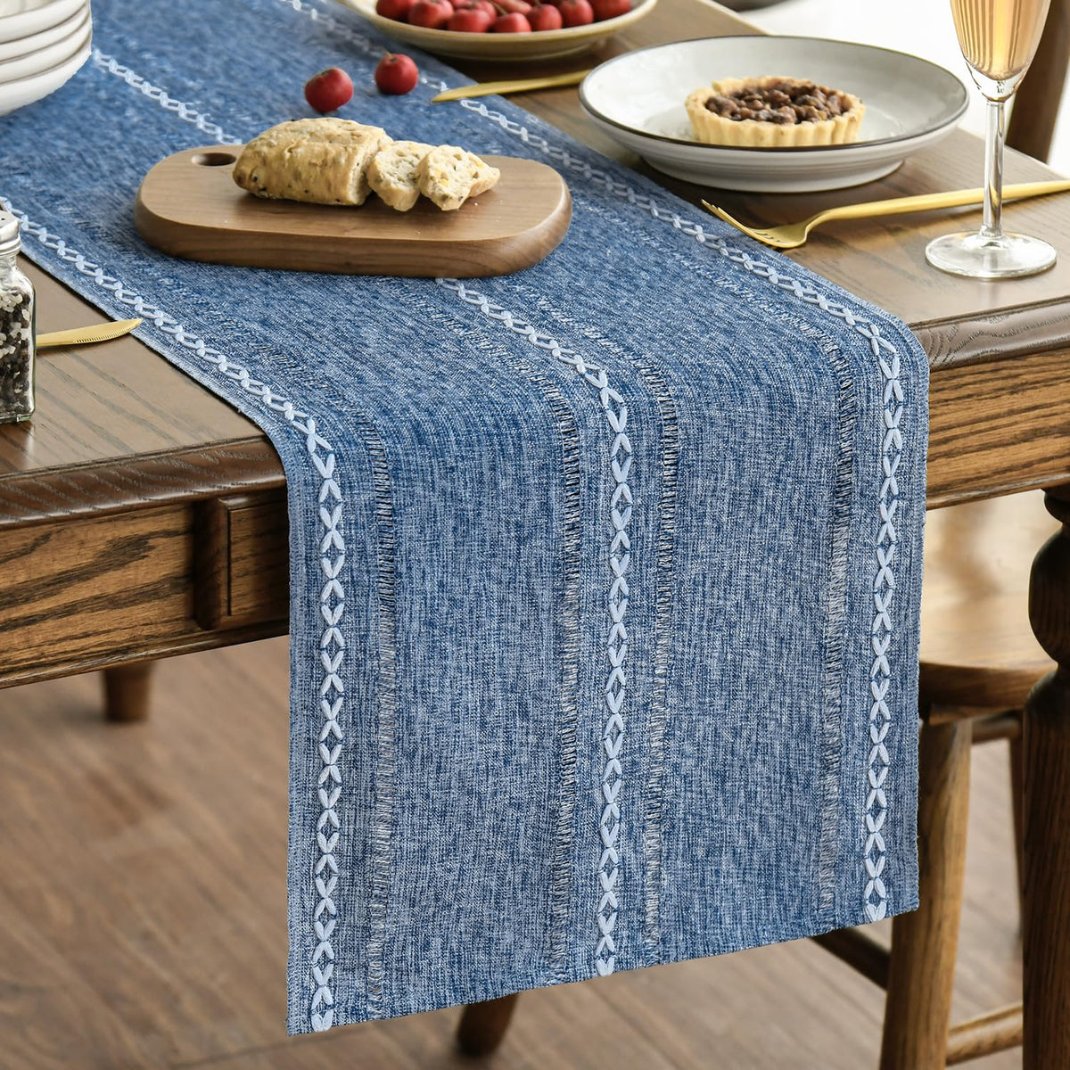 Artoid Mode blue rustic table runner close-up embroidery detail adds texture.