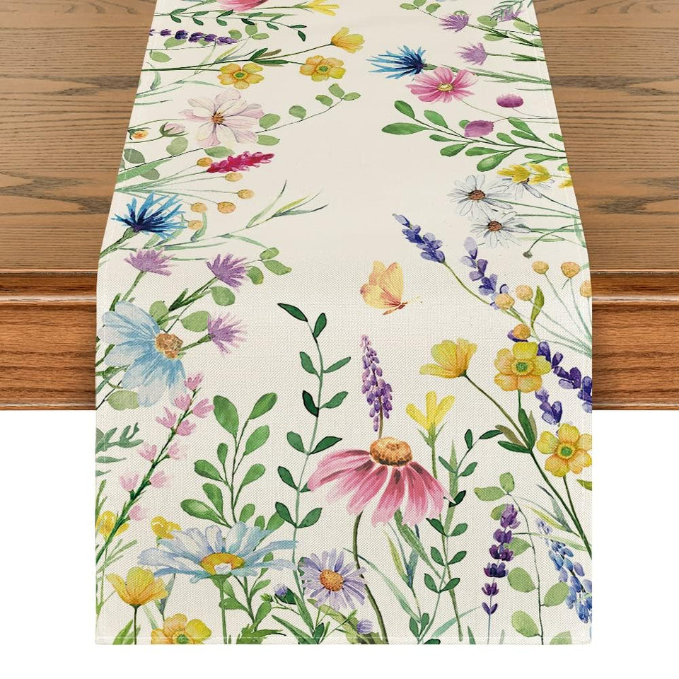 Artoid Mode daisy-eucalyptus-lavender pattern enhances lively table decor.