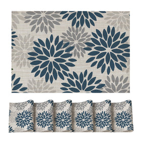 Artoid Mode floral vinyl placemats with blue-grey pattern protect surfaces.
