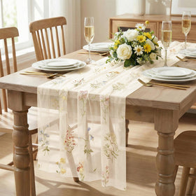 Closeup of Artoid Mode gauze embroidery on wildflower table runner