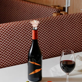 Arvintas wine stopper in bottle mouth demonstrates easy airtight sealing.