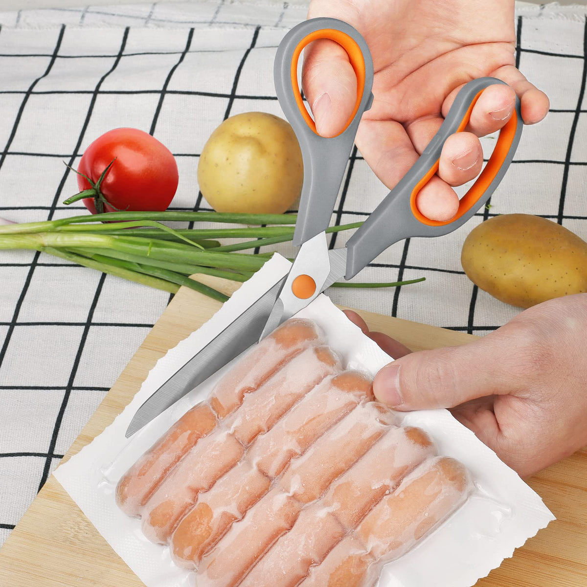 Asdirne kitchen scissors ideal for meat and seafood prep with precise control.