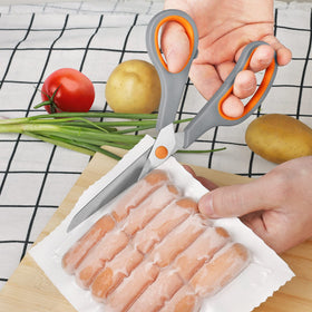 Asdirne kitchen scissors ideal for meat and seafood prep with precise control.
