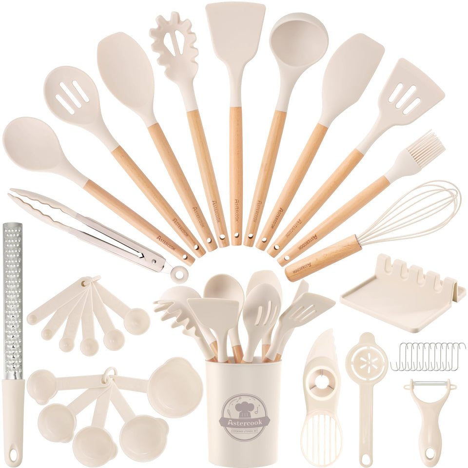 Astercook 39-piece silicone utensil set with wooden handles on the counter, ready for cooking