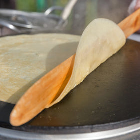 AsWeWixi 5-inch spreader helping consistent crepe thickness.