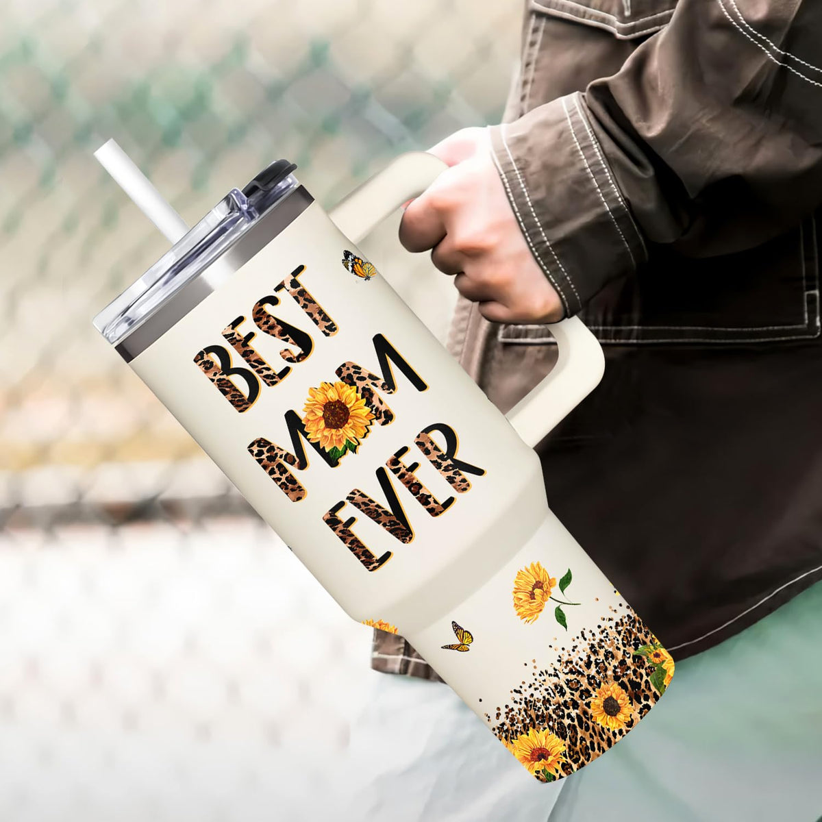 AT2Z Global tumbler features ergonomic handle for easy grip.