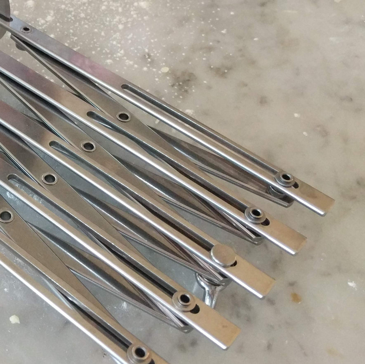 ATECO 5-wheel cutter in use cutting baked goods evenly