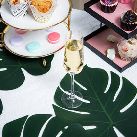 ATFL artificial palm leaves enhance home dining with rainforest flair.