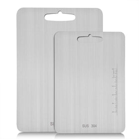 Atmama stainless steel cutting board surface detail for heavy chopping and durability.
