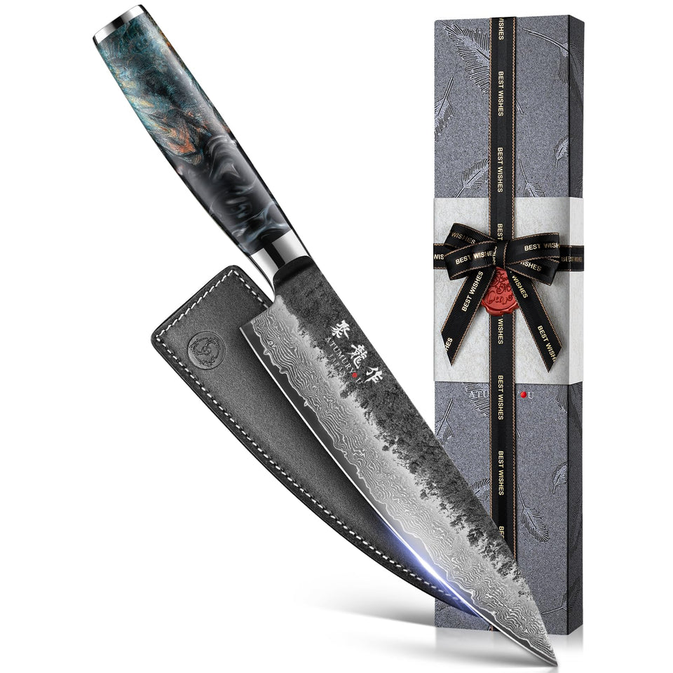 Atumuryou JPCK 8-inch knife blade close-up highlighting Damascus steel sharpness.