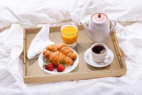 ATZYmolin ottoman-friendly tray protects surfaces while elevating décor
