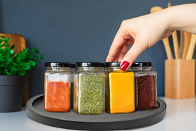 AUAM lazy susan on pantry shelf facilitates quick retrieval of jars