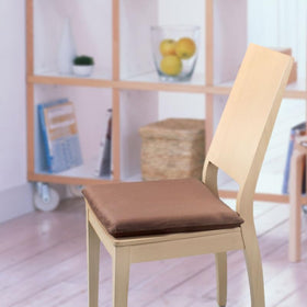 Augld indoor-outdoor friendly cushion adapts to different chair styles.
