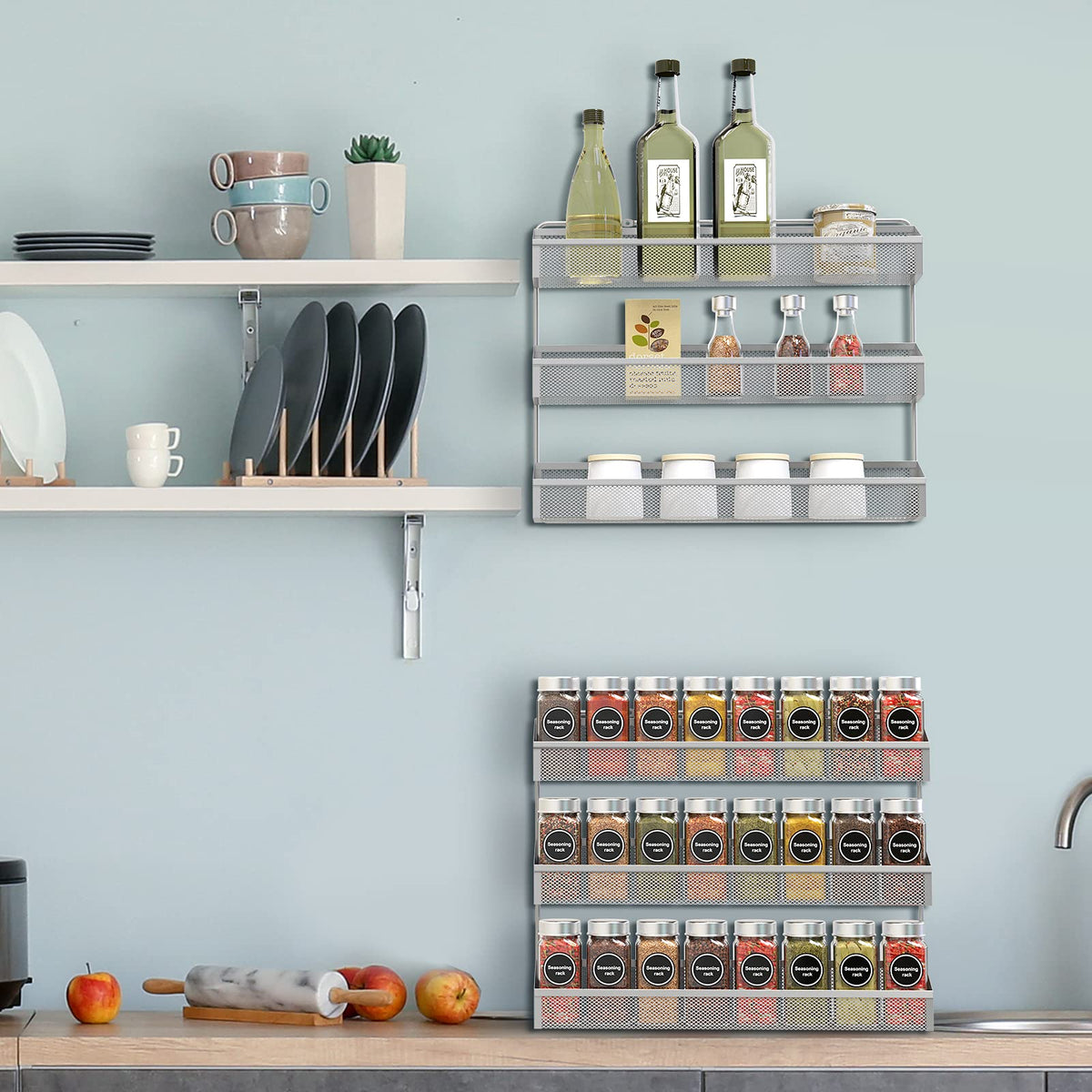 Auledio chrome wall-mounted spice rack neatly stores jars and condiments.