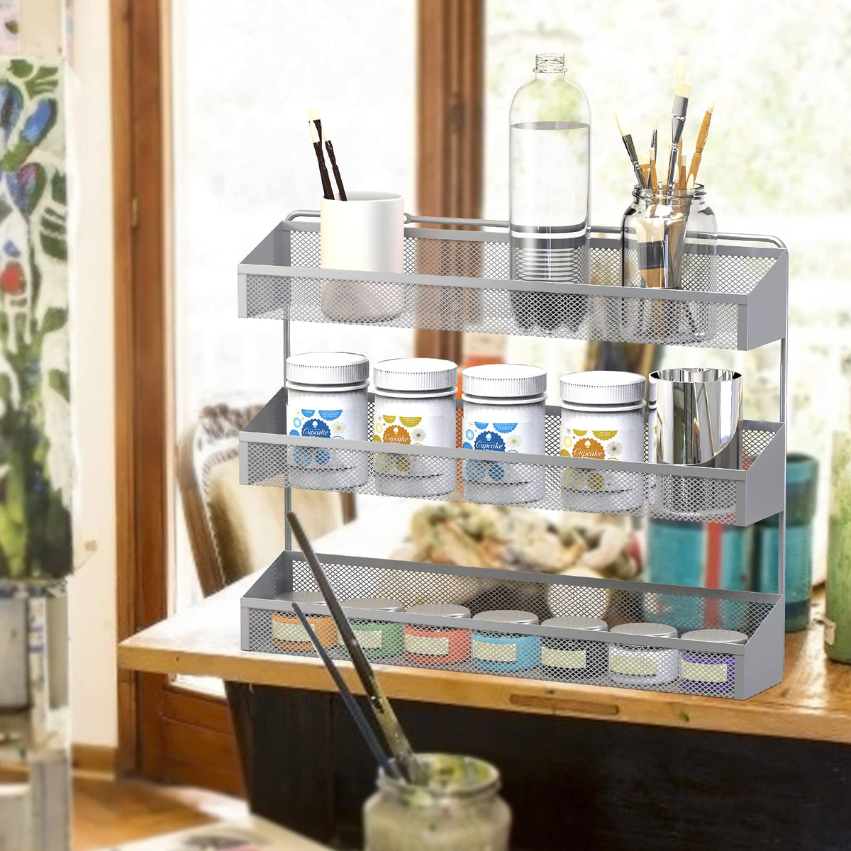 Auledio kitchen storage rack 3-tier helps keep tea bags and jars tidy.