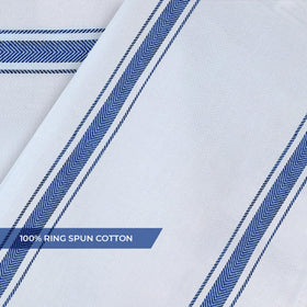 Avalon Kitchen dish towels hanging to dry on a rack in blue.